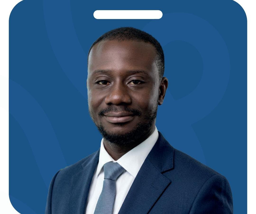 Kwame Boamah Ansong in a navy suit